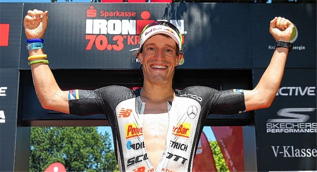 Sebastian Kienle in Siegerpose