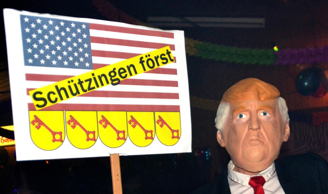 Das Faschingsbild ist zwar schon ein paar Jahre alt, ist aber aktuell wie nie zuvor: Wie muss Deutschland (und Schützingen) auf die Handelspolitik Trumps reagieren? Foto: Archuv