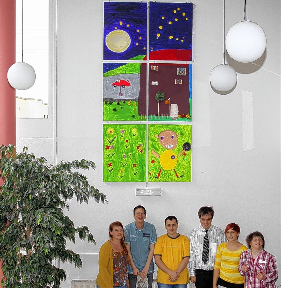 Das gerade enthüllte Kunstwerk im Wohnheim-Foyer und seine Schöpfer (v. li.): Sandra Hunn, Michael Storz, Ralph Ziegler, Michael Hampel, Nicole Waschina und Eva-Maria Morgenstern. 