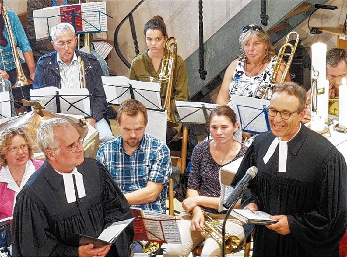 Pfarrer und Automechaniker