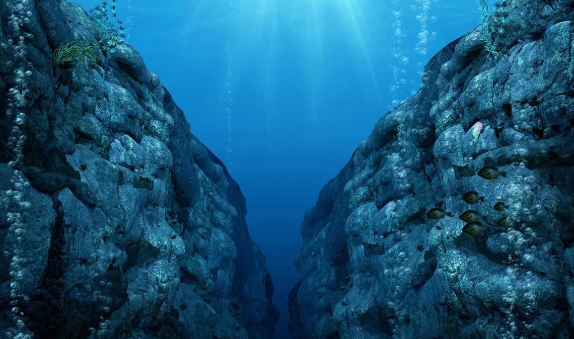 Der rund 2400 Kilometer lange Tiefseegraben liegt im westlichen Pazifischen Ozean und hat eine  maximale Tiefe von rund 11 000 Metern (3D-Illustration).