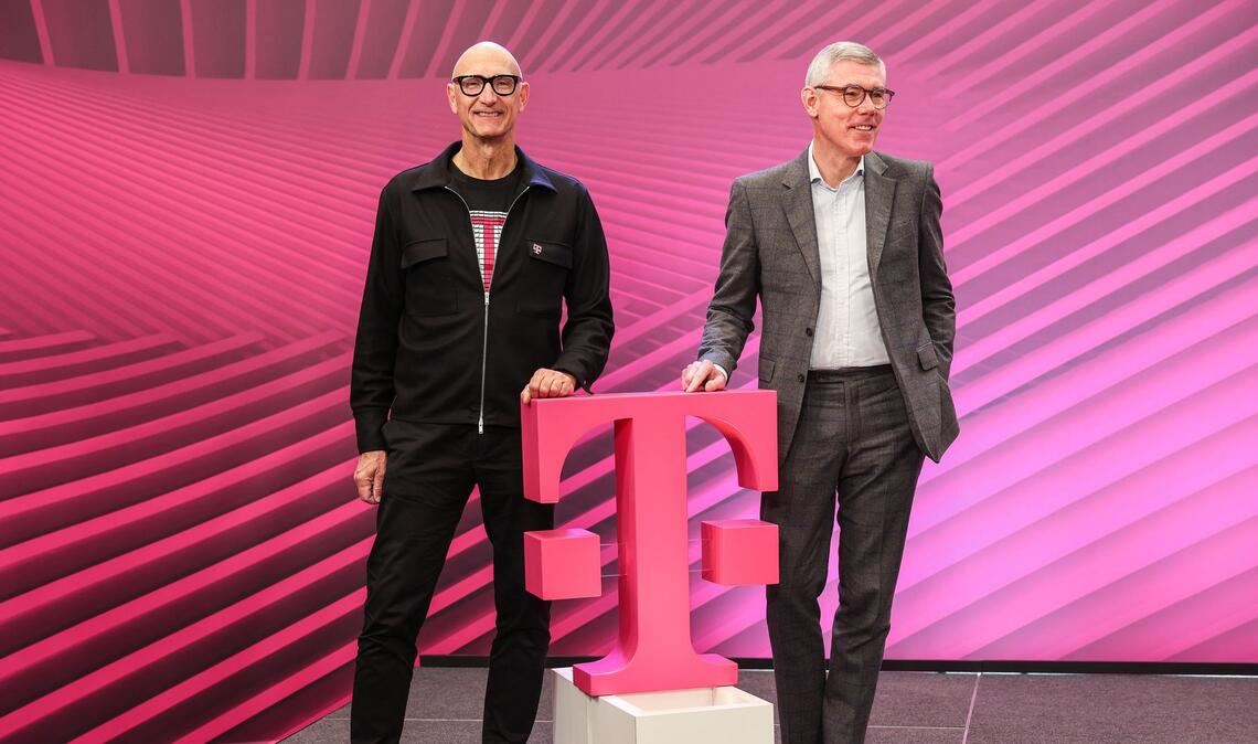 Die Magenta-Manager Tim Höttges (links) und Christian Illek.