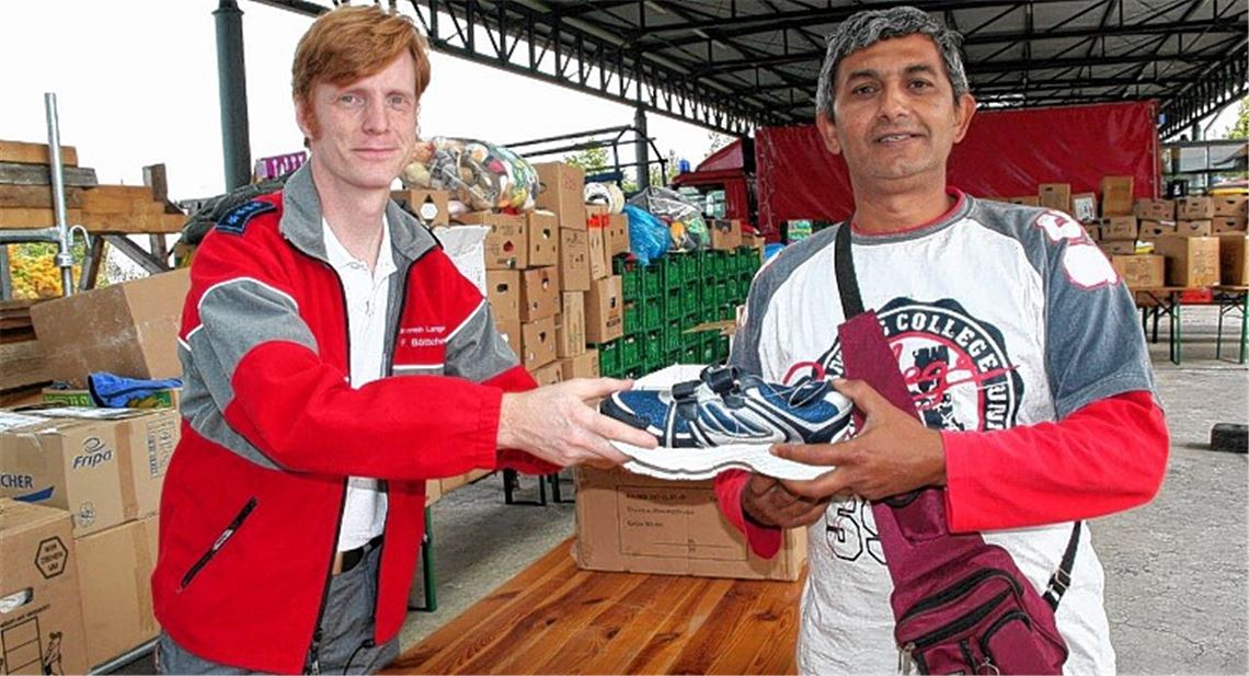 Im Bruchsaler Camp kümmern sich Helfer um Flüchtlinge aus verschiedenen Ländern, Foto: DRK