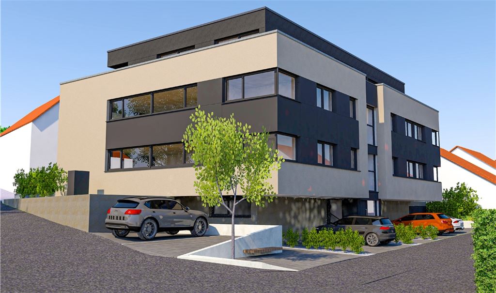 Ist es eine „Bausünde“ oder eine gekonnte Nachverdichtung? Das geplante Neunfamilienhaus füllt das Eckgrundstück ganz aus, hier von der Pichlerstraße aus bergauf betrachtet, rechts geht die Straße „Auf der Schanz“ ab, im Umkreis niedrigere Gebäude. Foto: Screenshot