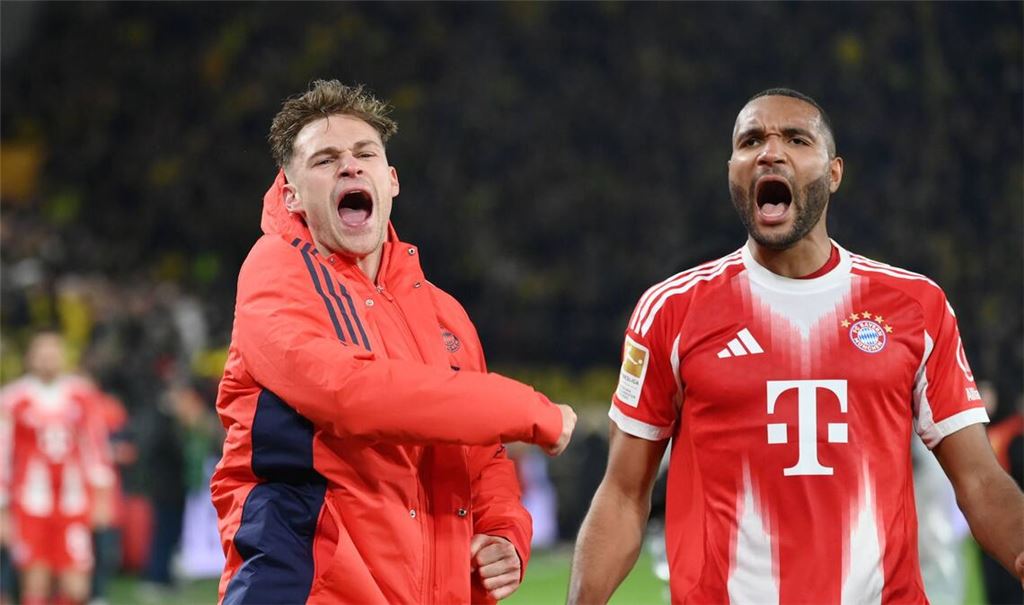 Joshua Kimmich und Jonathan Tah jubeln nach dem Sieg.