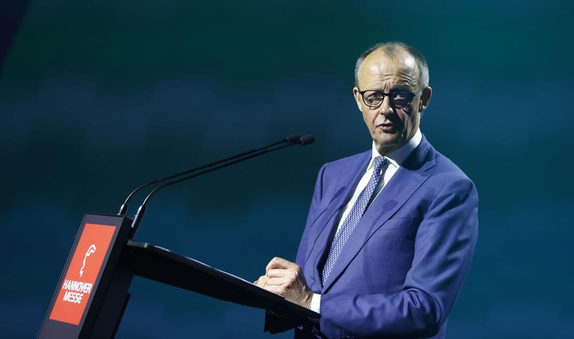 Kanzler Merz muss sich auf der Messe auch Kritik aus der Industrie anhören.