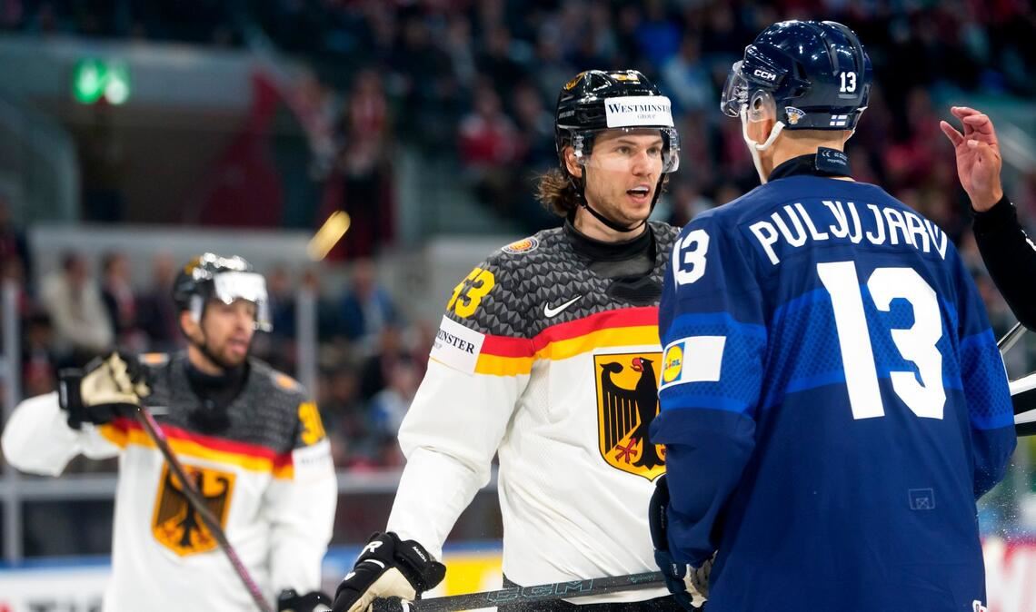 Kapitän Moritz Seider im Wortgefecht mit NHL-Kollege Jesse Puljujarvi.