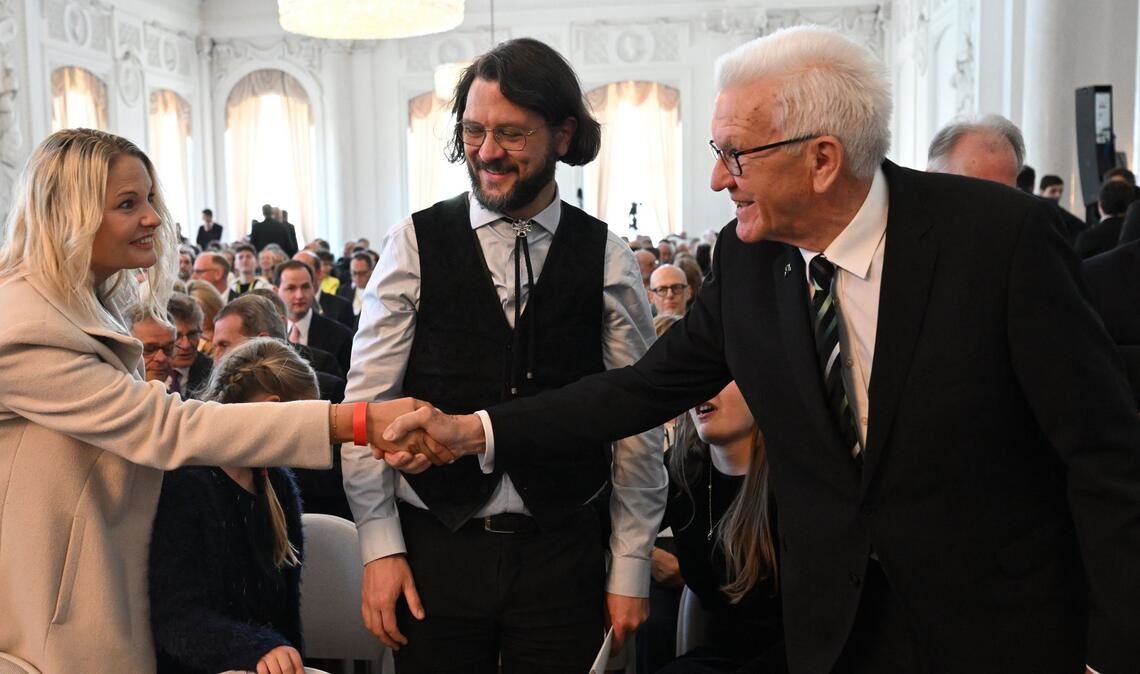 Mehr Zeit für die Familie: Kretschmann mit Sohn Johannes (Mitte).
