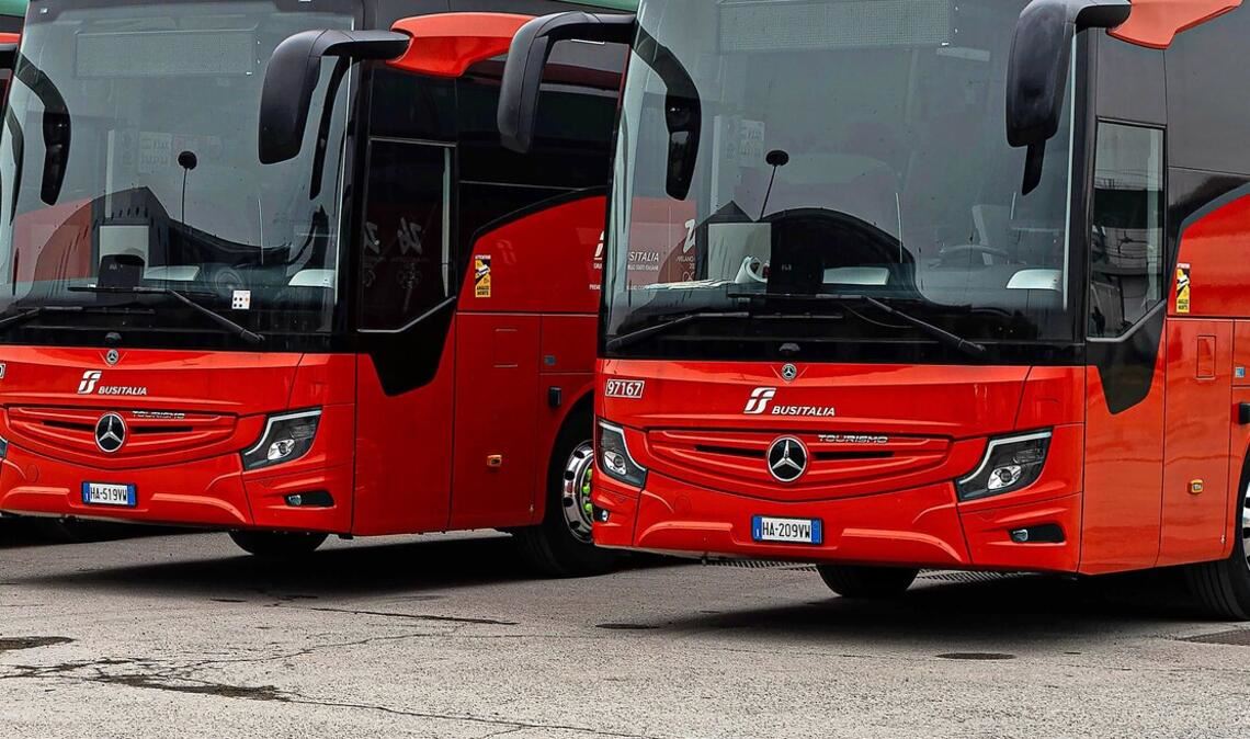 Ohne sie geht bei Olympia gar nichts: die Busse in Cortina