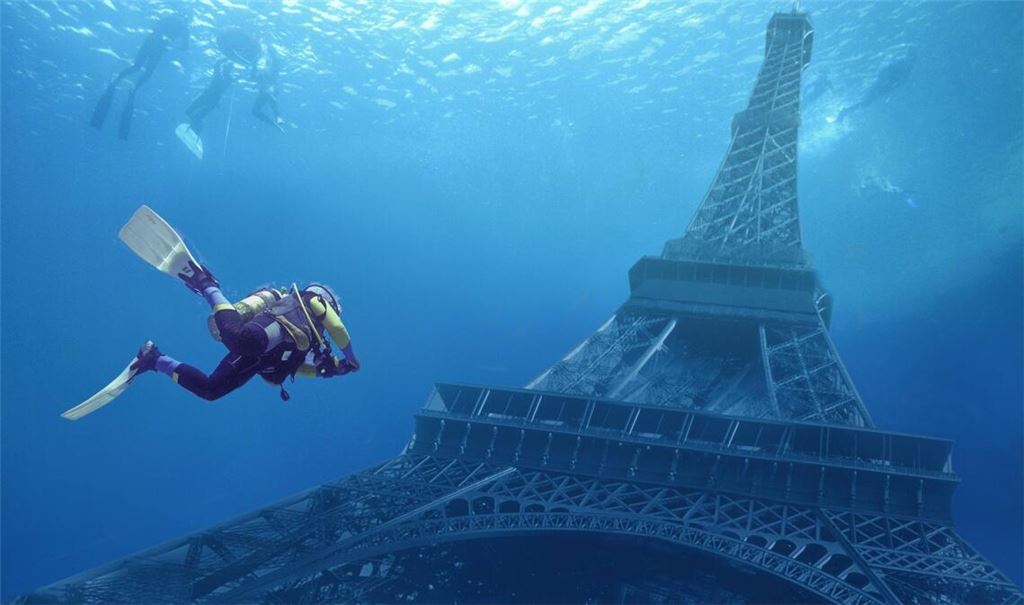 So schlimm wie auf diesem Bild wird es wohl nicht werden – dass der Eifelturm vom Meer überflutet wird. Aber Forscher schlagen wegen des steigenden Meeresspiegels für Küstenstädte Alarm.